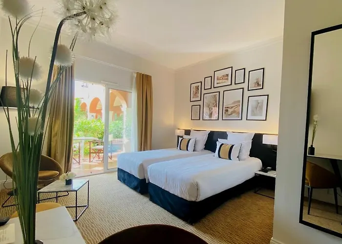 Vacancéole - Résidence Le Palmyra Golf Aparthotel 4*