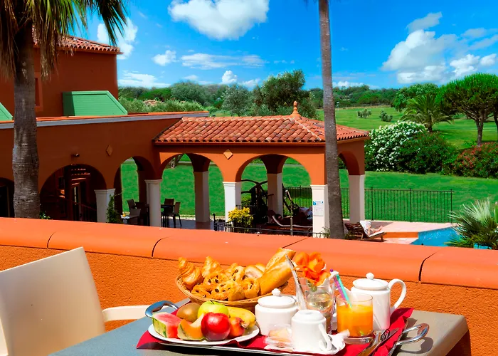 Vacancéole - Résidence Le Palmyra Golf Aparthotel